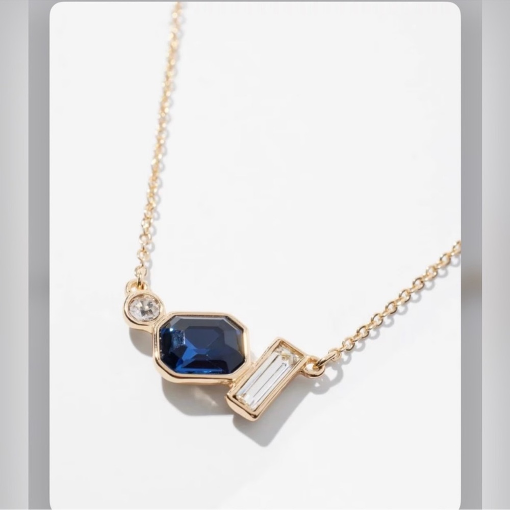 WHBM gold crystal dark blue pendant necklace